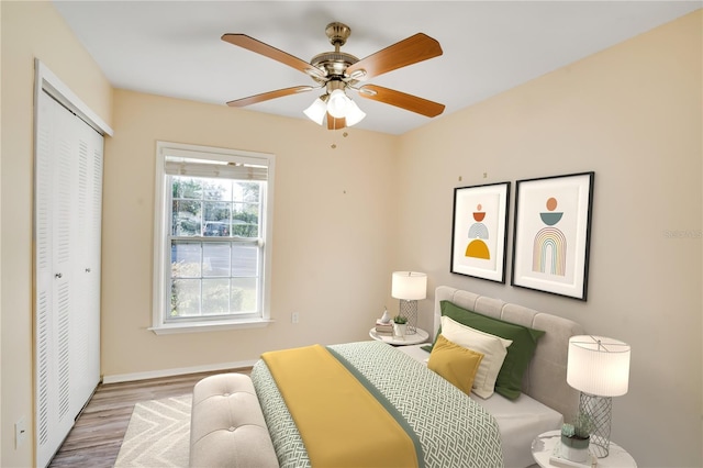 2053 Dixie Belle Dr Unit 2053C, Orlando, FL 32812 - bedroom with wood finished floors, a closet, and ceiling fan