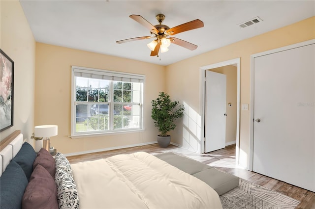 2053 Dixie Belle Dr Unit 2053C, Orlando, FL 32812 - bedroom featuring light wood-style floors and a ceiling fan