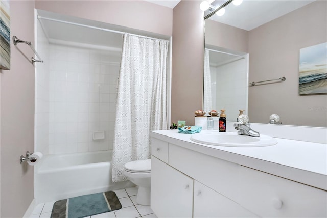 full bathroom with tile patterned floors, vanity, toilet, and shower / bath combo with shower curtain