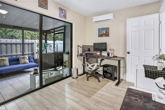 office space with light hardwood / wood-style floors and an AC wall unit