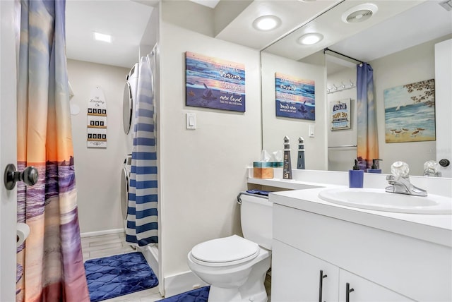 bathroom with hardwood / wood-style floors, vanity, and toilet