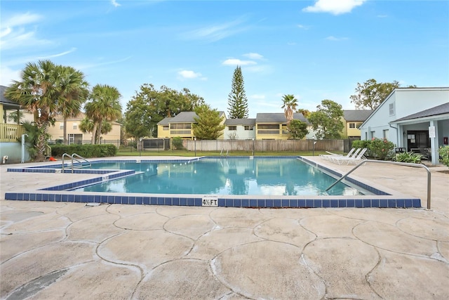 view of swimming pool featuring a patio