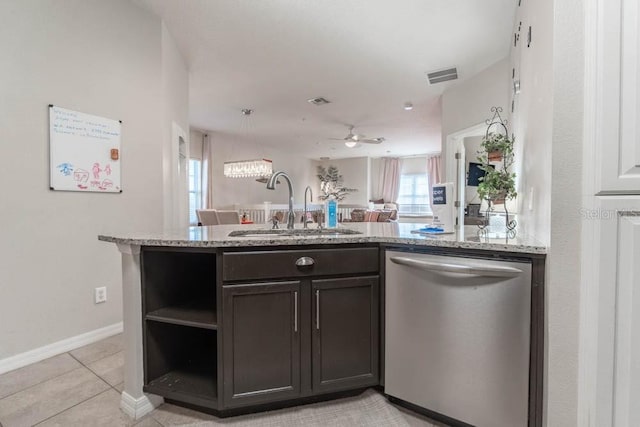 kitchen with kitchen peninsula, ceiling fan, dishwasher, dark brown cabinetry, and sink