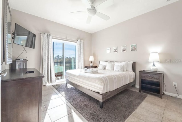 tiled bedroom featuring ceiling fan and access to outside