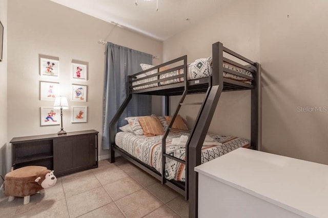 bedroom featuring light tile patterned floors