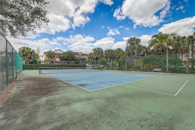 view of tennis court with basketball court