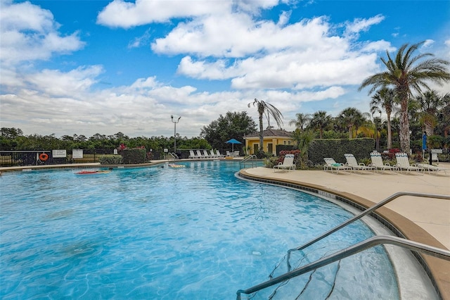 view of swimming pool featuring a patio area