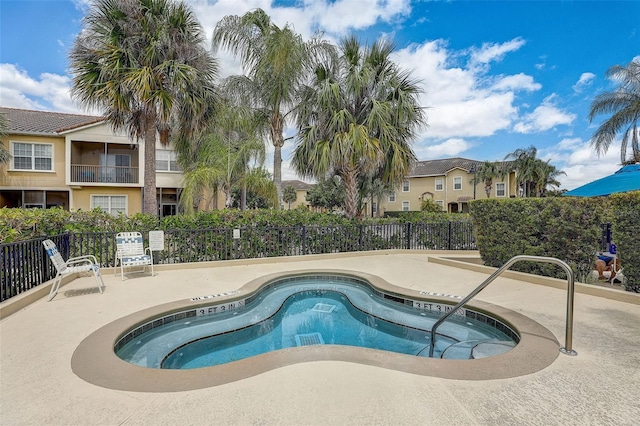 view of pool featuring a patio