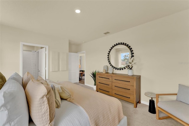 bedroom with light carpet