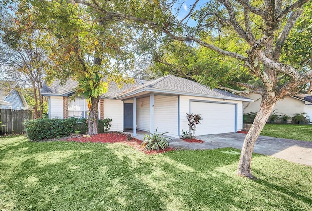 ranch-style house with a front yard and a garage