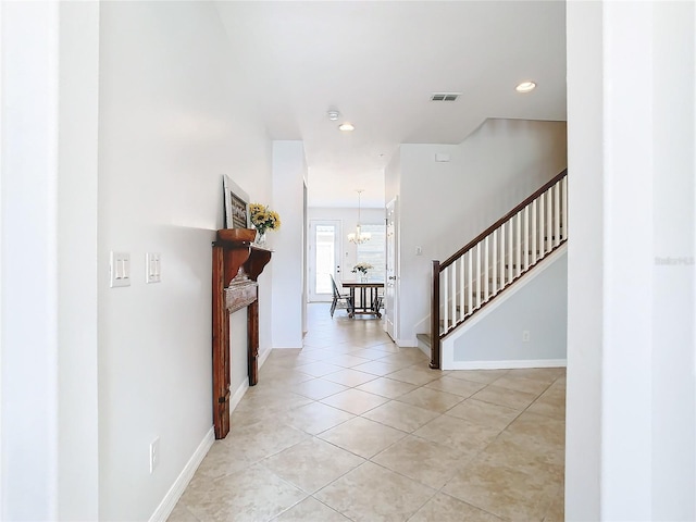 hallway with light tile patterned floors