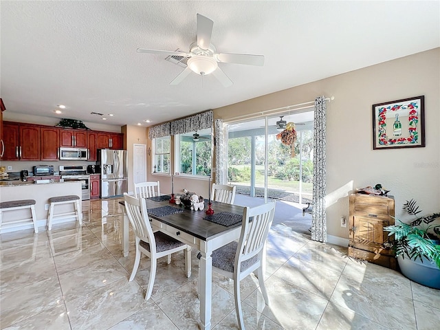 944 Torrey Pine Dr, Winter Springs, FL 32708 - dining space with ceiling fan, light marble finish floors, a textured ceiling, and recessed lighting