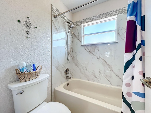 bathroom featuring toilet and shower / bath combo with shower curtain