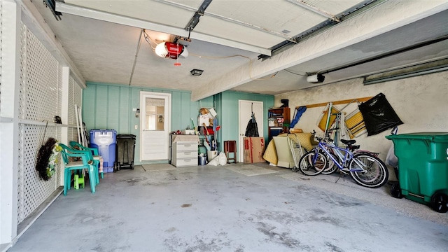 garage featuring a garage door opener