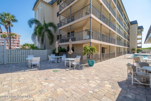 exterior space featuring a community pool