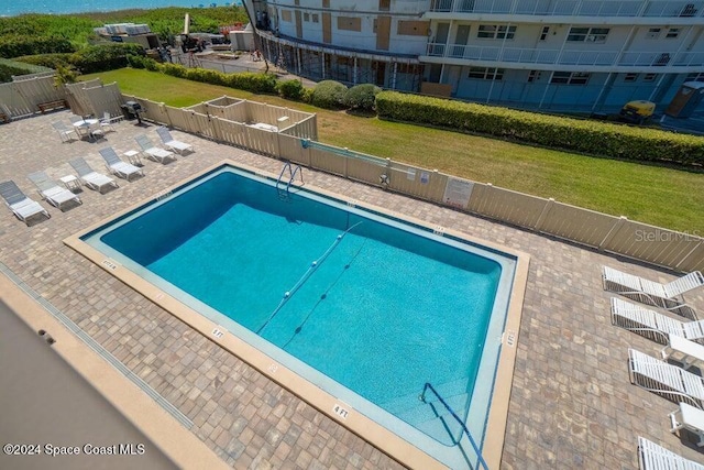 view of pool with a patio