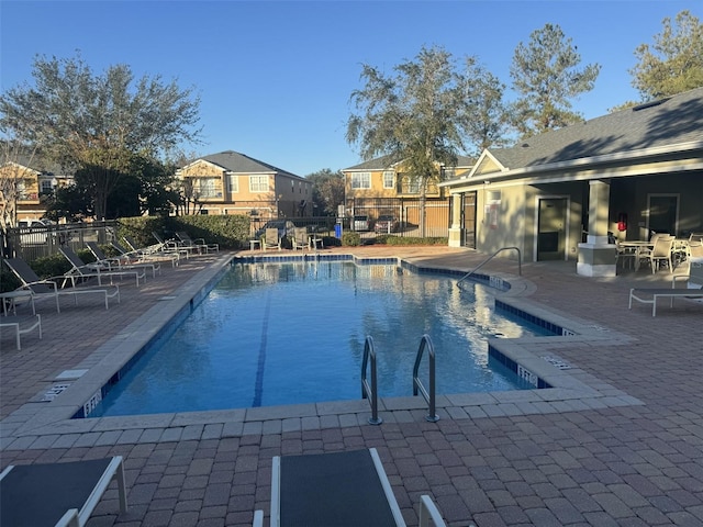 view of pool featuring a patio area