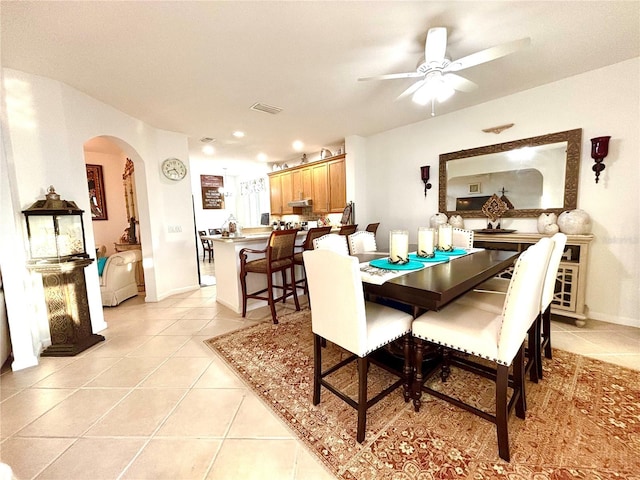 dining room featuring ceiling fan and light tile patterned flooring