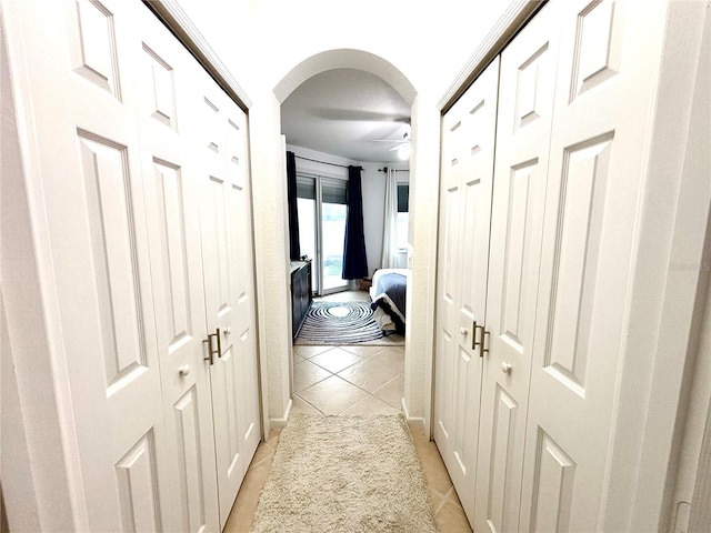 hallway with light tile patterned flooring