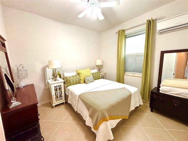 tiled bedroom with ceiling fan and a wall mounted AC