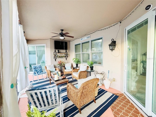 interior space featuring ceiling fan