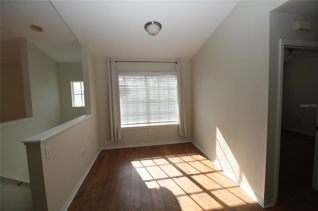 unfurnished room featuring hardwood / wood-style floors