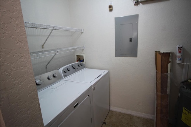 washroom featuring independent washer and dryer and electric panel