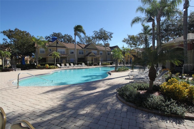 view of pool featuring a patio area