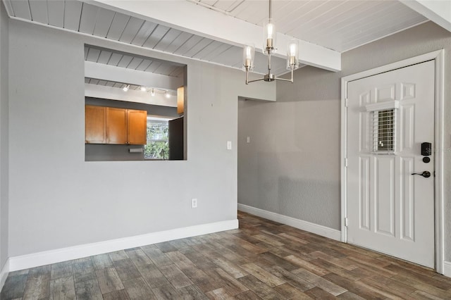 unfurnished dining area featuring wood ceiling, dark hardwood / wood-style flooring, beamed ceiling, and a chandelier