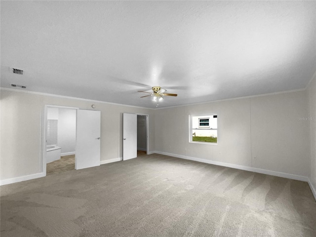 unfurnished bedroom with carpet floors, ceiling fan, and ornamental molding