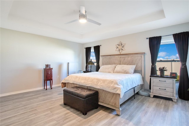 bedroom featuring ceiling fan and light wood-type flooring