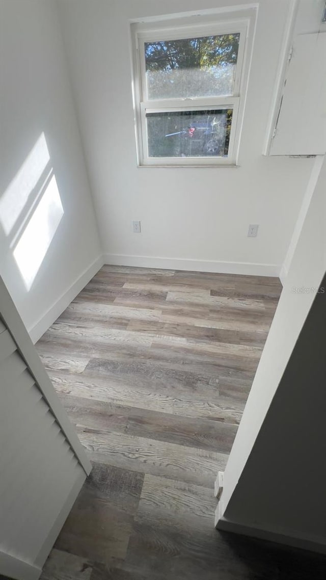 spare room featuring light hardwood / wood-style floors