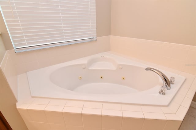 bathroom with tiled tub