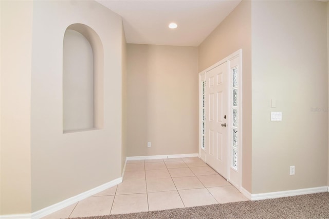 foyer with light tile patterned floors