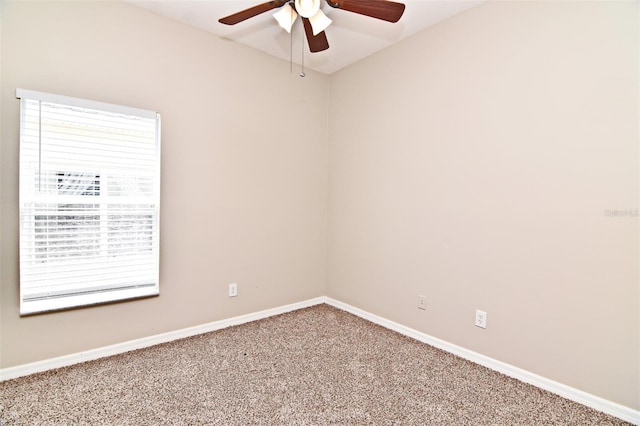 carpeted empty room with ceiling fan