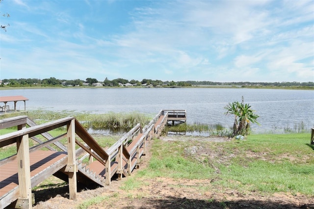 dock area with a water view