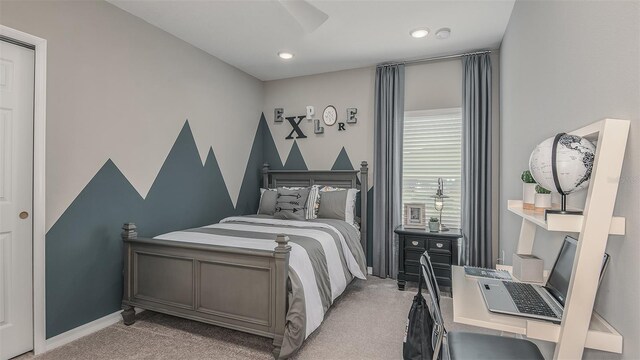 bedroom featuring light colored carpet