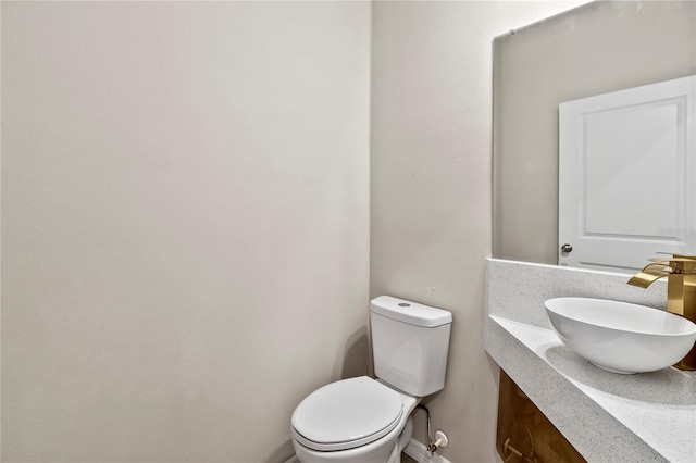 bathroom featuring sink and toilet