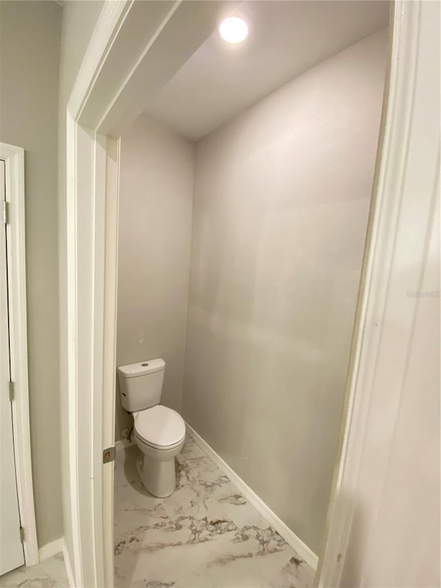 bathroom featuring toilet