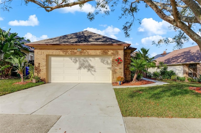 single story home featuring a front yard and a garage