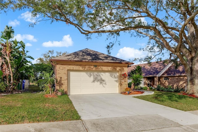 ranch-style home featuring a garage and a front lawn