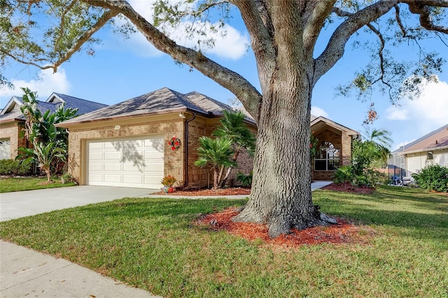 ranch-style house featuring a front yard and a garage