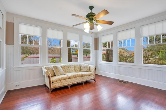 sunroom / solarium with ceiling fan