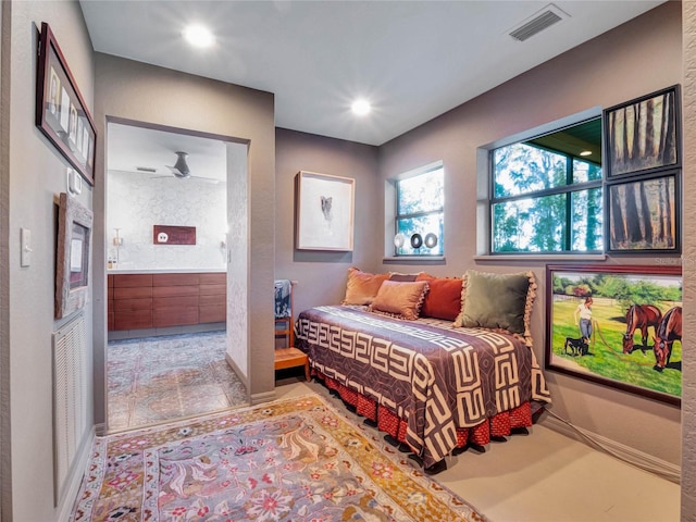 bedroom featuring ensuite bath