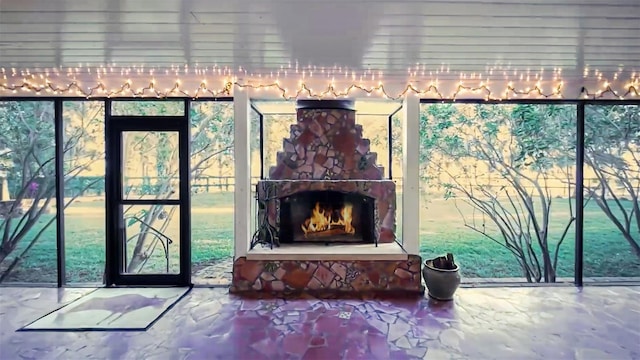 room details featuring a stone fireplace