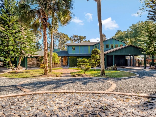 view of front of house featuring a carport