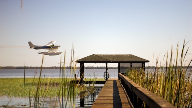 dock area featuring a water view