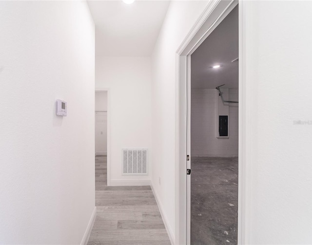 hallway featuring light wood-type flooring