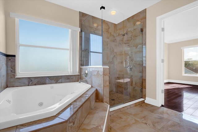 bathroom featuring plus walk in shower