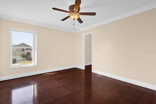 unfurnished room featuring dark hardwood / wood-style floors, ceiling fan, and ornamental molding